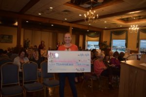 Melissa Gundlach accepts the check for the Humane Society from 100 Women Who Care - Oct 2018