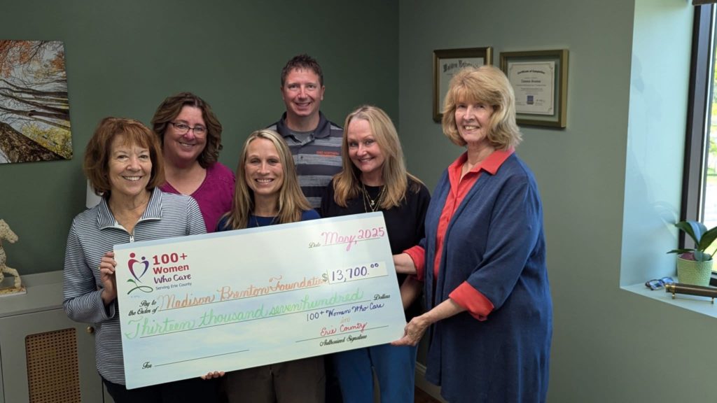 Donation given to Madison Brenton Foundation Board members from 100 WWC reps