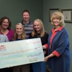 Donation given to Madison Brenton Foundation Board members from 100 WWC reps