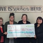 Presentation of check to Safe Harbor